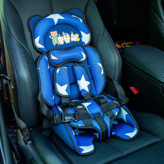 Blue children's car seat with star pattern on a car seat