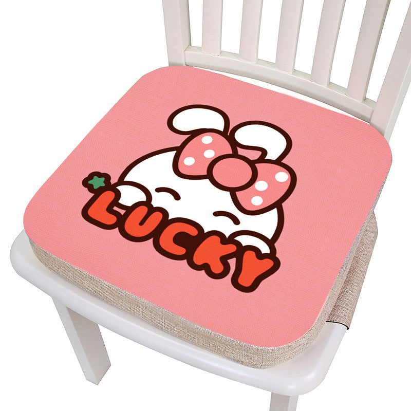 Pink chair cushion with cartoon character and 'LUCKY' text on a white chair.