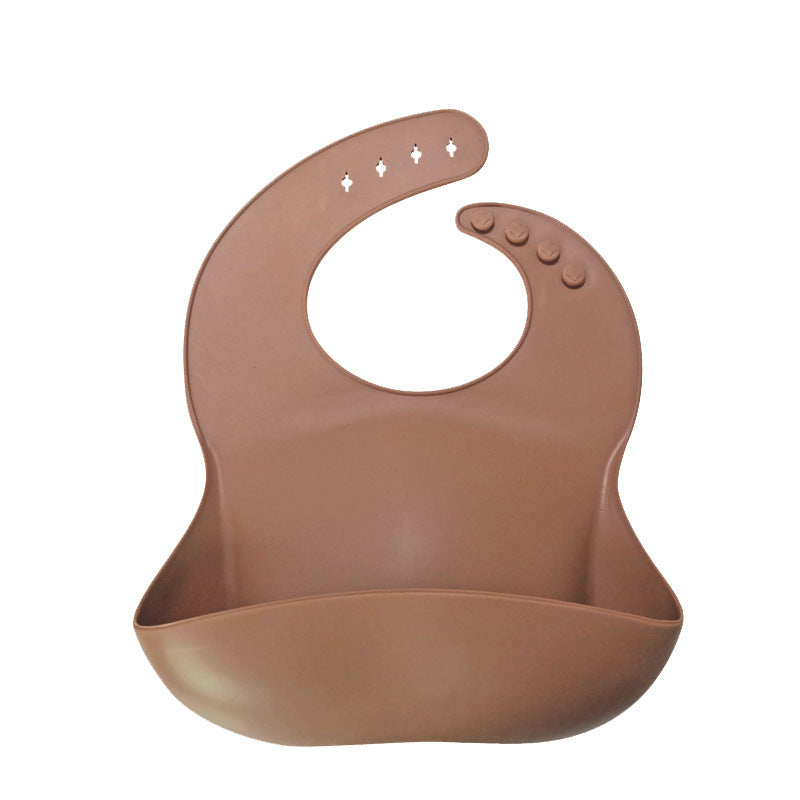 Brown silicone bib on a white background