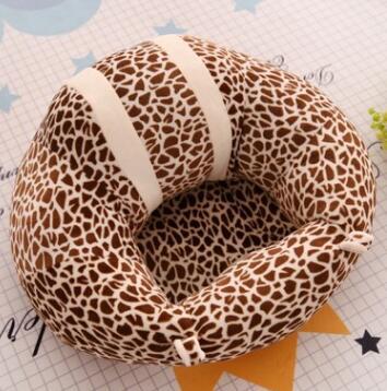 Leopard print neck pillow on a checkered background