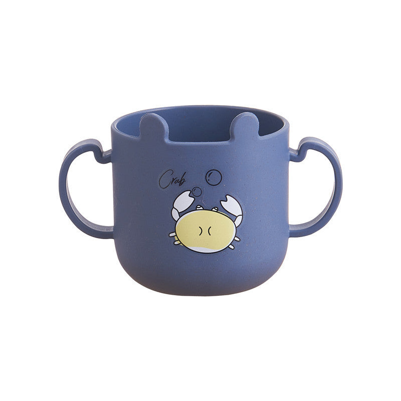 Blue children's cup with cartoon face design on a white background