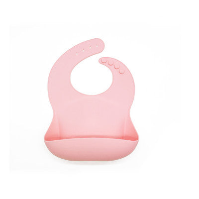 Pink silicone bib on a white background