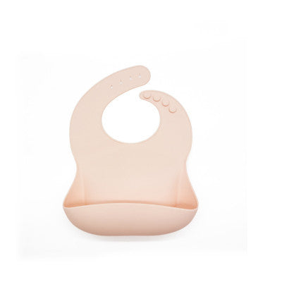Pink silicone bib on a white background