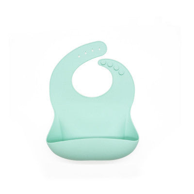 Mint green silicone bib on a white background