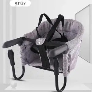 Baby carrier with gray cover and black straps on a white background