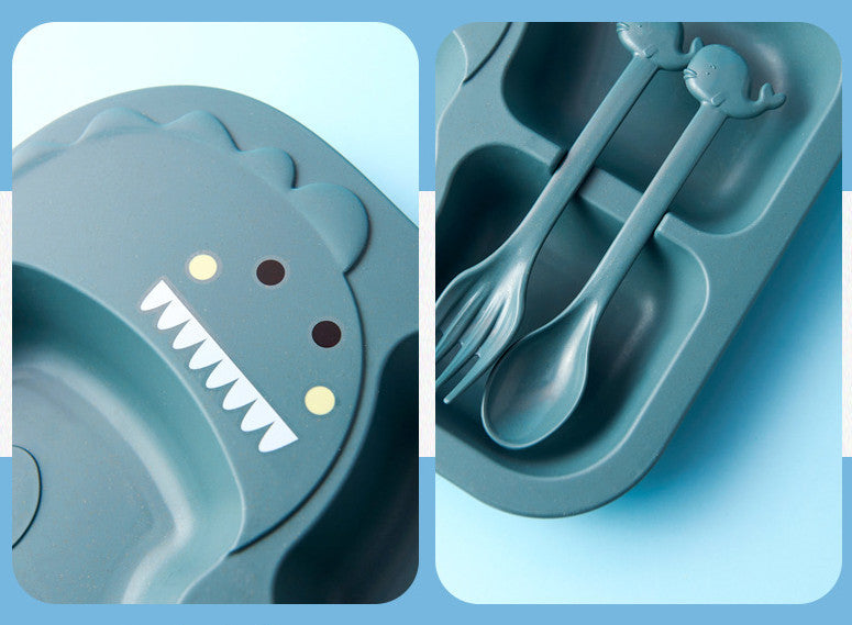 Children's tableware set with shark-shaped plate and cutlery on a blue background