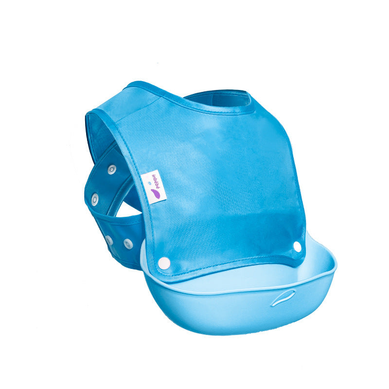 Blue baby bib with a matching tray on a white background
