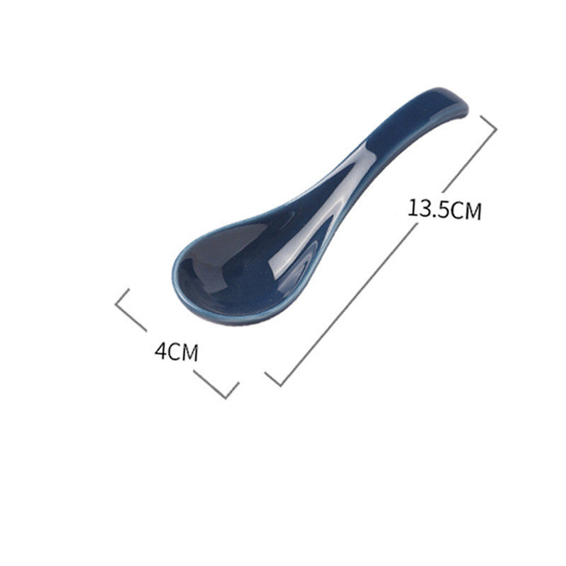 Blue ceramic spoon with dimensions labeled on a white background