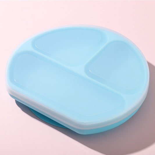 Blue plastic lid with compartments on a pink background