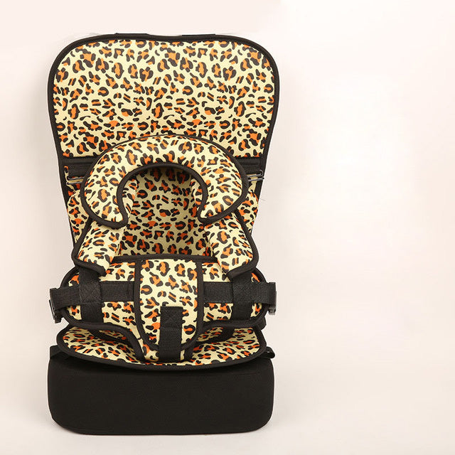 Leopard print baby seat on a beige background