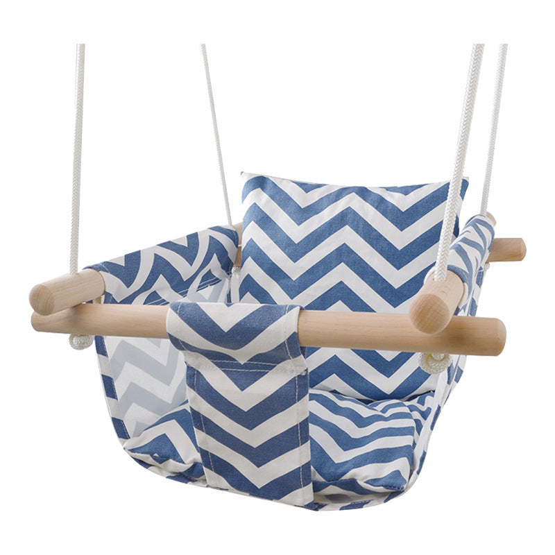 Blue and white zigzag patterned swing with wooden handle on a white background
