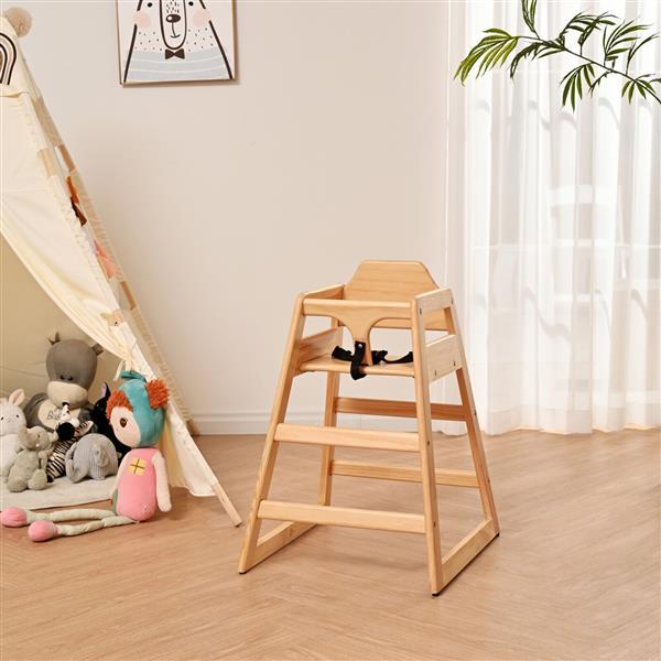 Wooden high chair in a room with toys and a tent