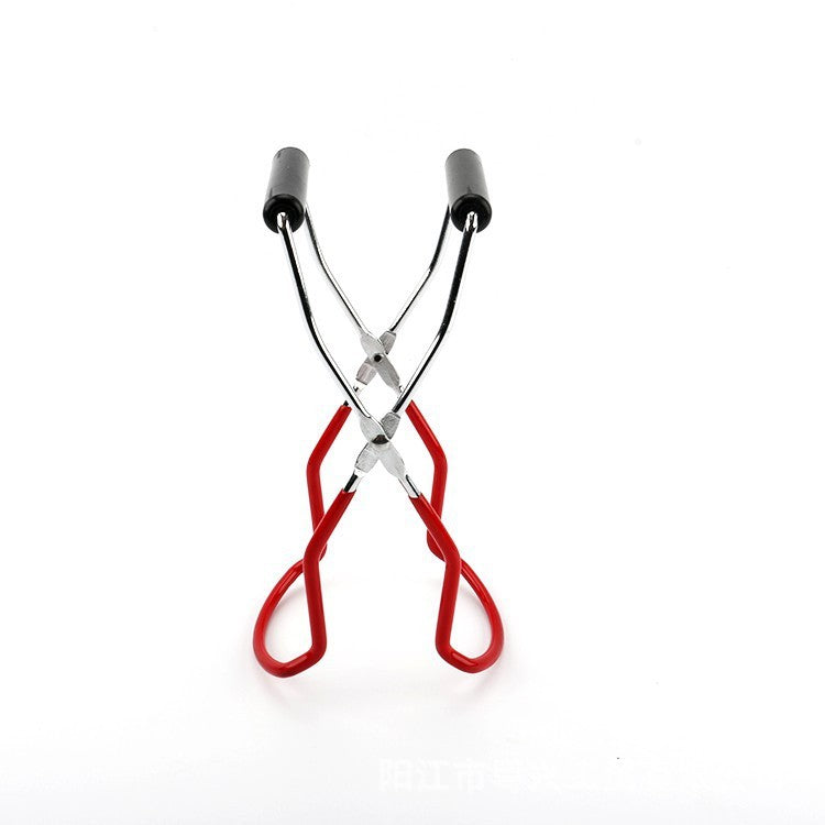 Eyelash curler with red loops and black ends on a white background