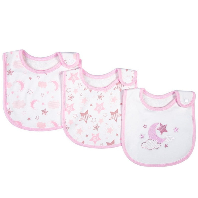 Three baby bibs with pink trim and star, moon, and cloud patterns on a white background.