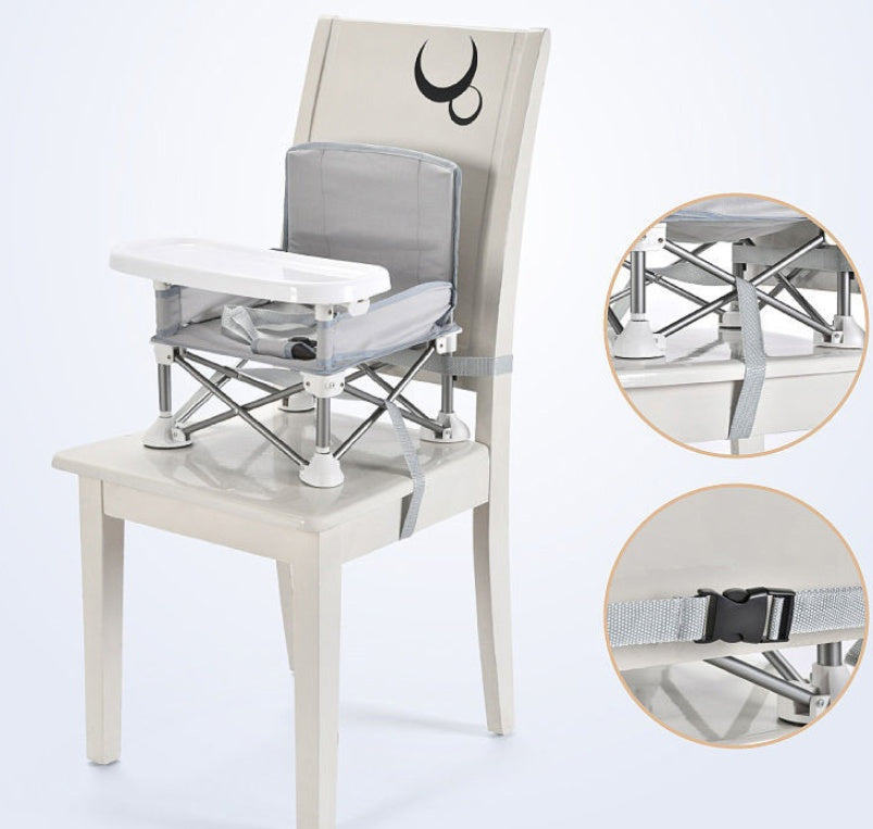 Foldable baby high chair attached to a chair with close-up details on a white background