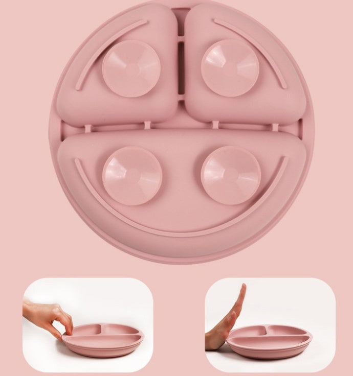Pink silicone mold with compartments on a pink background