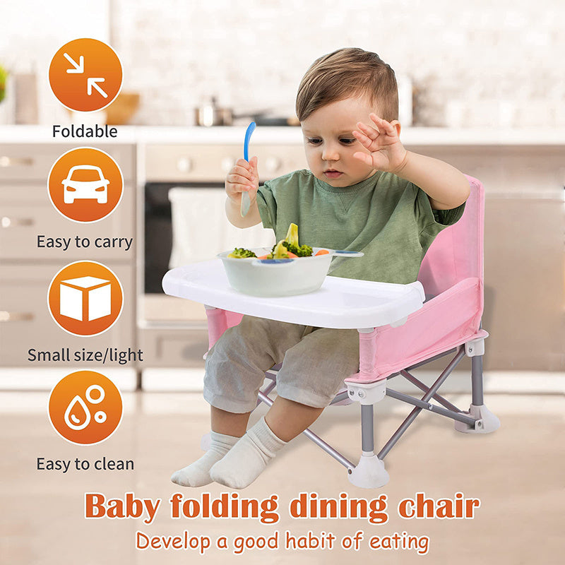 Child sitting in a pink baby folding dining chair with features listed on the left.