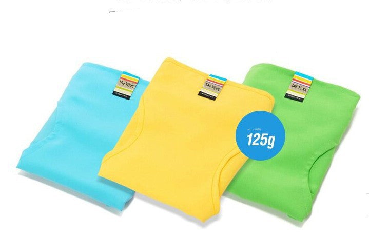 Three folded towels in blue, yellow, and green with a label indicating weight on a white background.