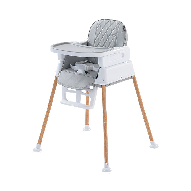 Gray and white high chair with wooden legs on a white background