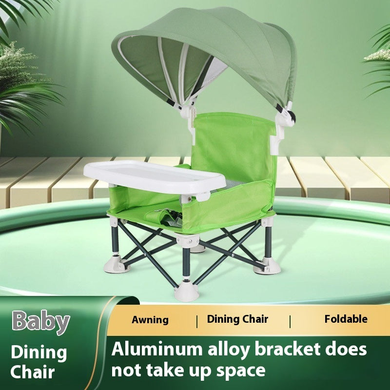 Green baby dining chair with canopy on a wooden floor with green background