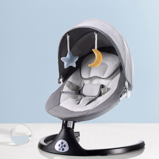 Baby swing with star and moon hanging toys on a light blue background