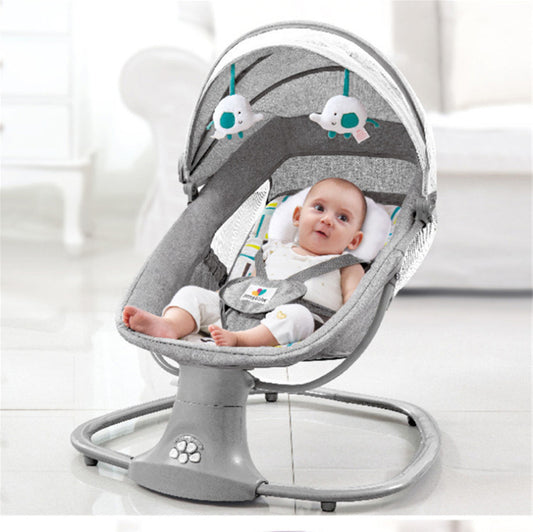 Baby in a gray baby swing with white background