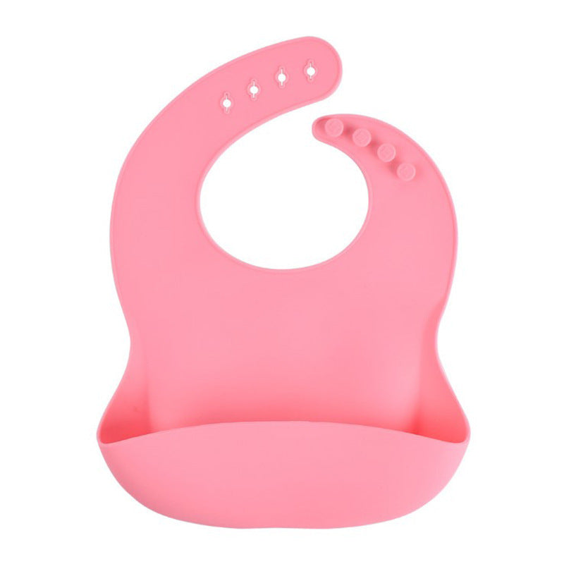Pink silicone bib on a white background