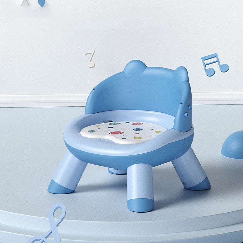 Blue children's chair with floral seat on a light blue background