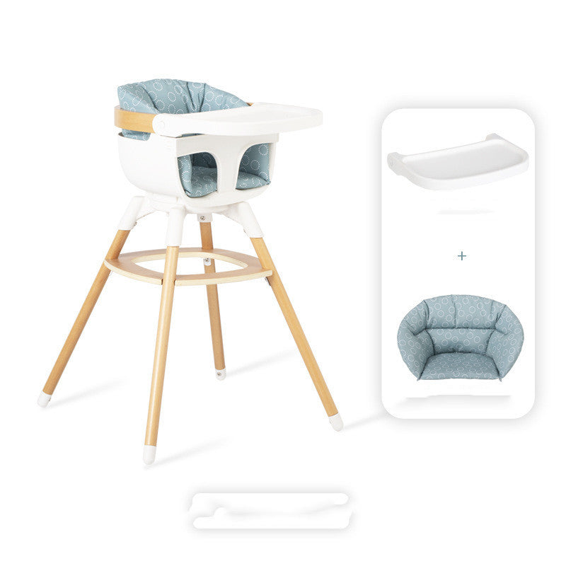 High chair with wooden legs and white cushion, accompanied by a matching baby seat cover on a white background.