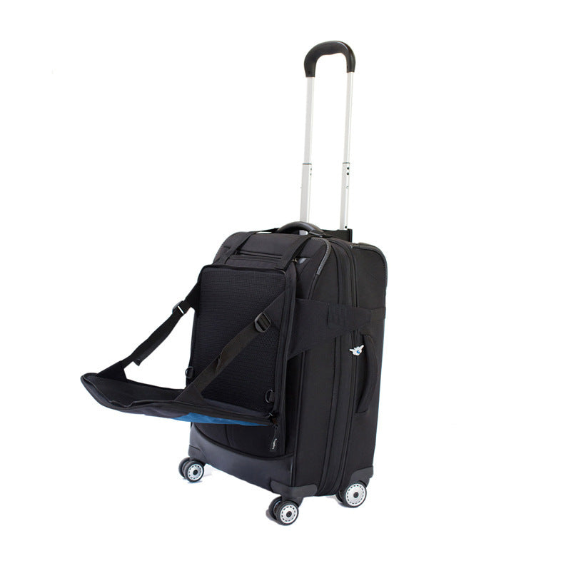 Black suitcase with wheels and a handle on a white background