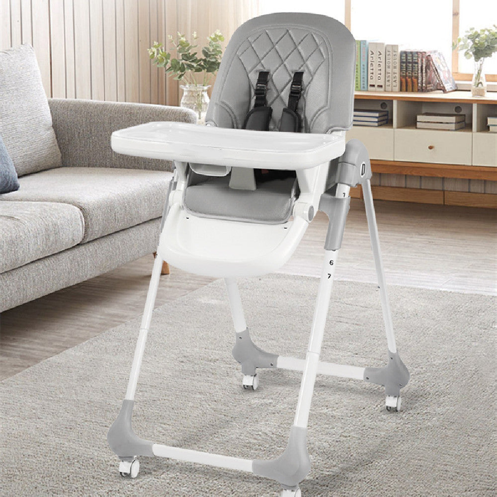 Gray and white high chair in a living room setting