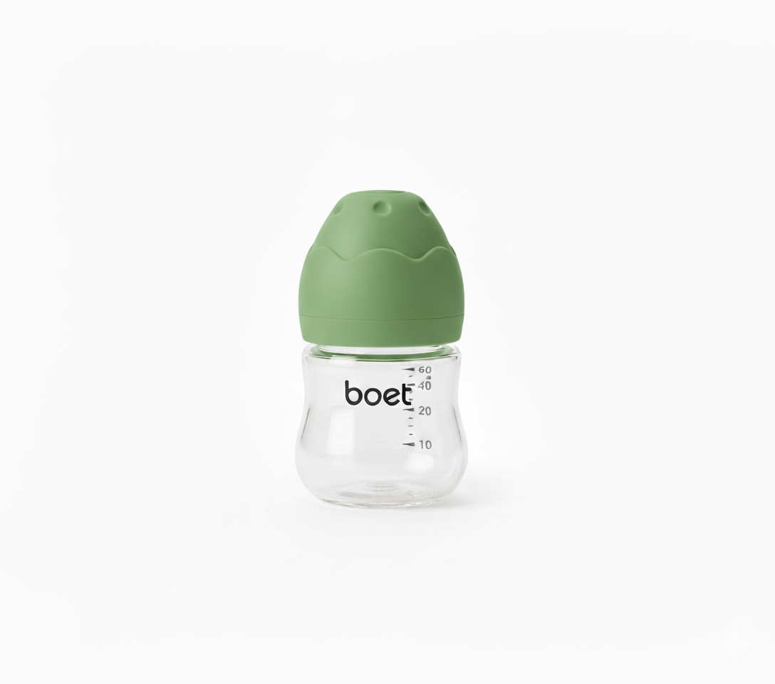Green baby bottle with 'boet' branding on a white background