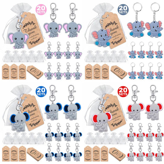 Collection of elephant keychains with 'thank you' tags in clear bags on a white background