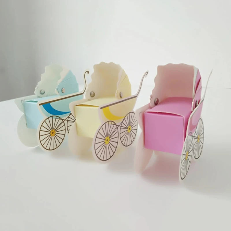 Three colorful baby carriages on a white background