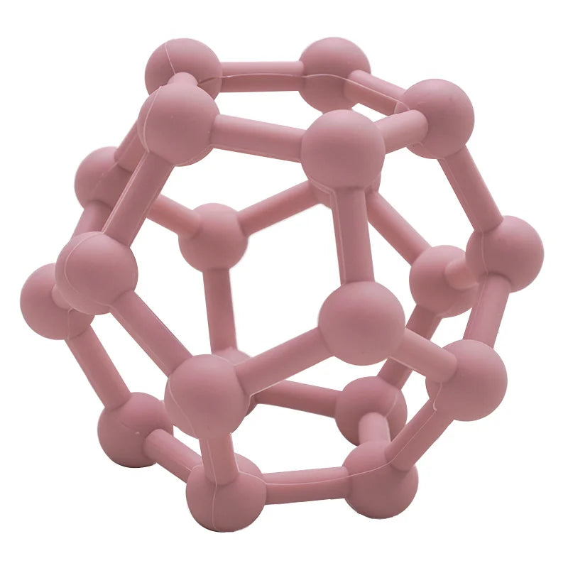 Pink geometric ball toy on a white background