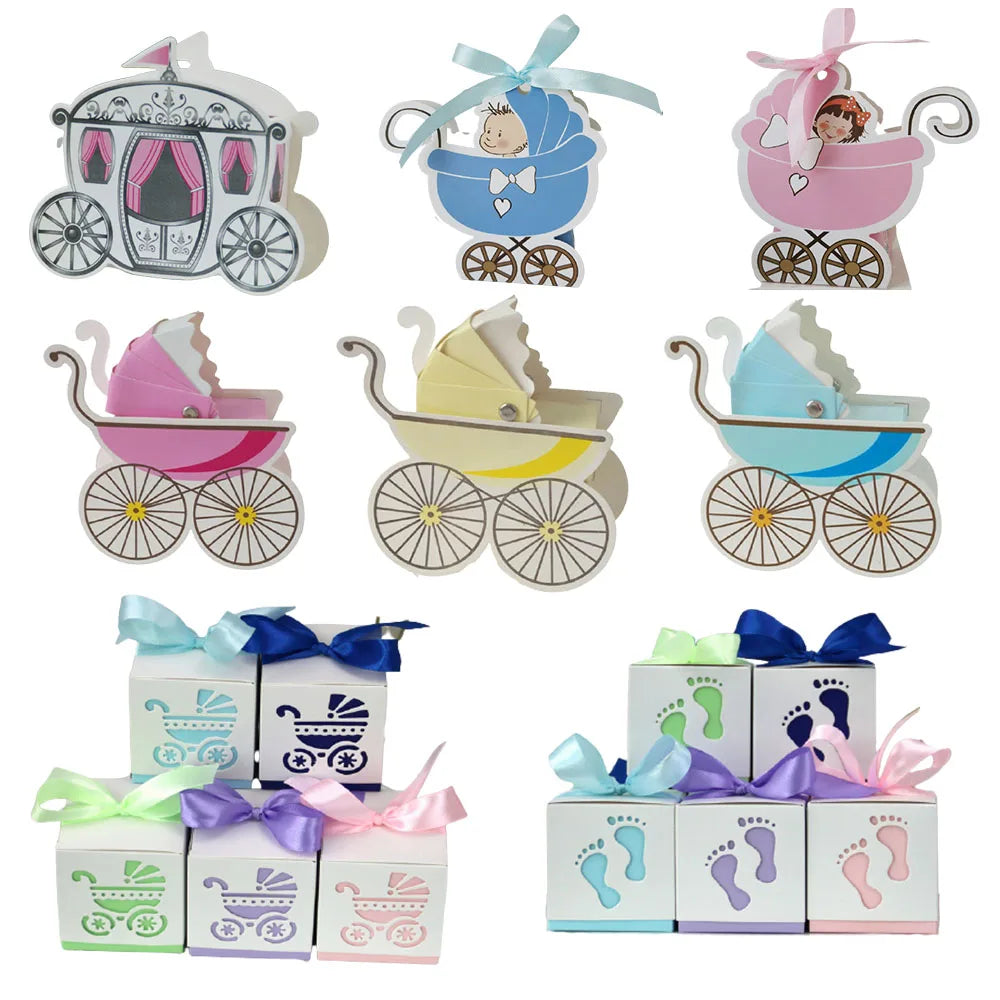Collection of baby carriage-themed gift boxes and decorations on a white background