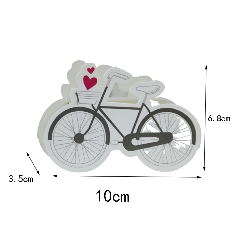 Bicycle-shaped object with a heart on a white background, showing measurements.