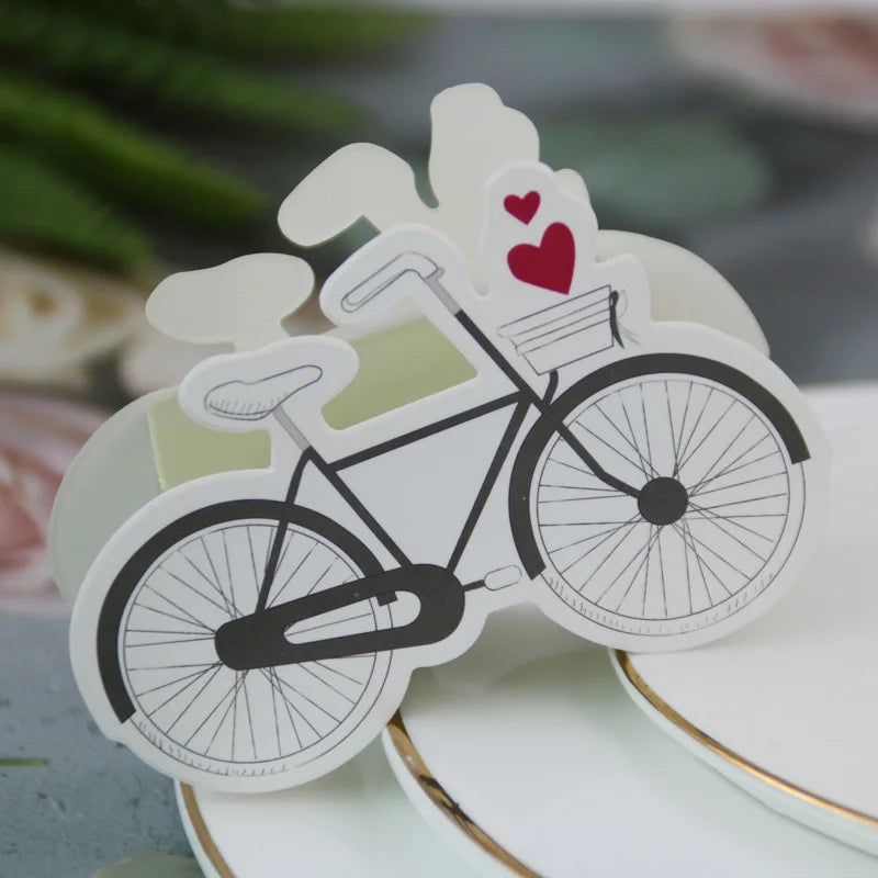 Sticker of a bicycle with hearts on a white surface