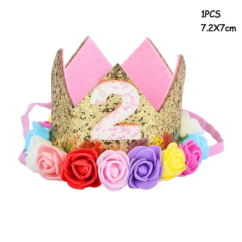 Gold and pink birthday crown with number '2' and colorful flowers on a white background