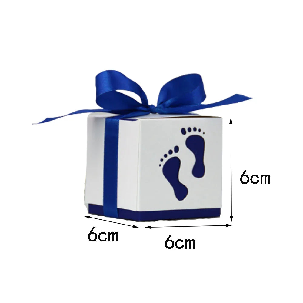 White gift box with blue ribbon and footprints, dimensions indicated.