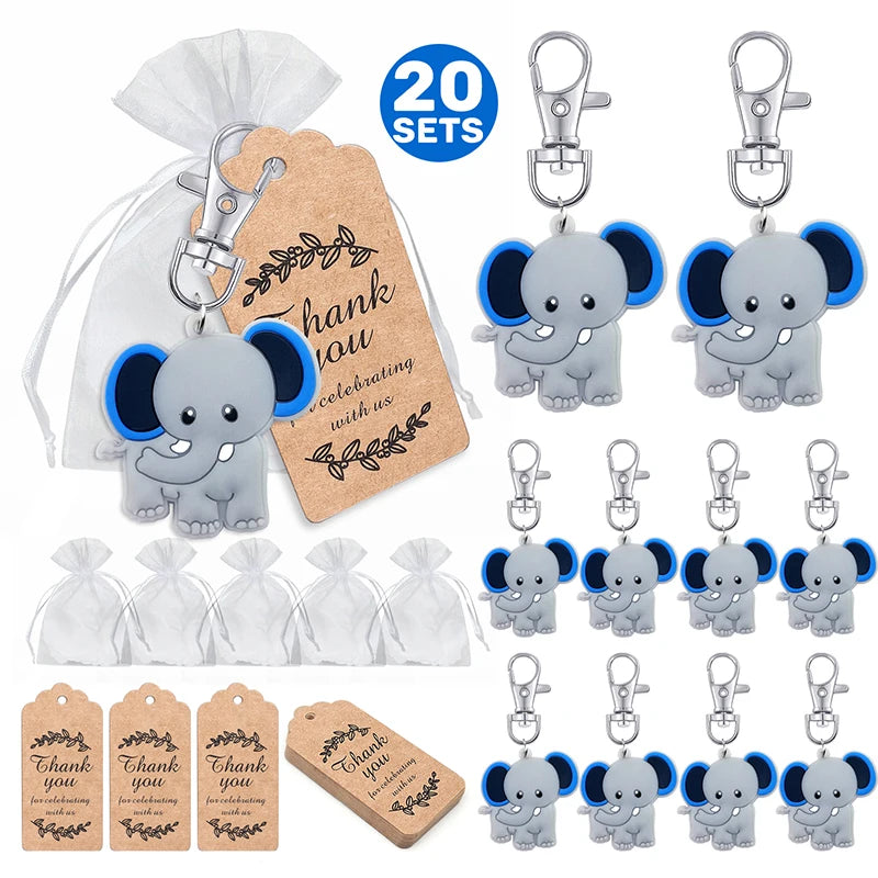 Set of elephant keychains with packaging and tags on a white background
