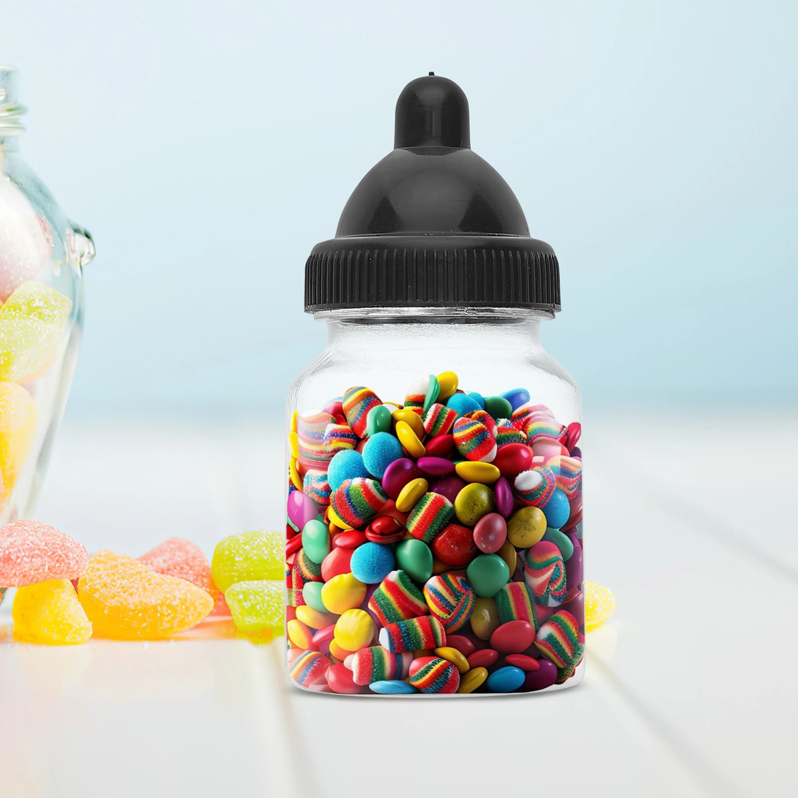 Jar filled with colorful candies on a light blue background