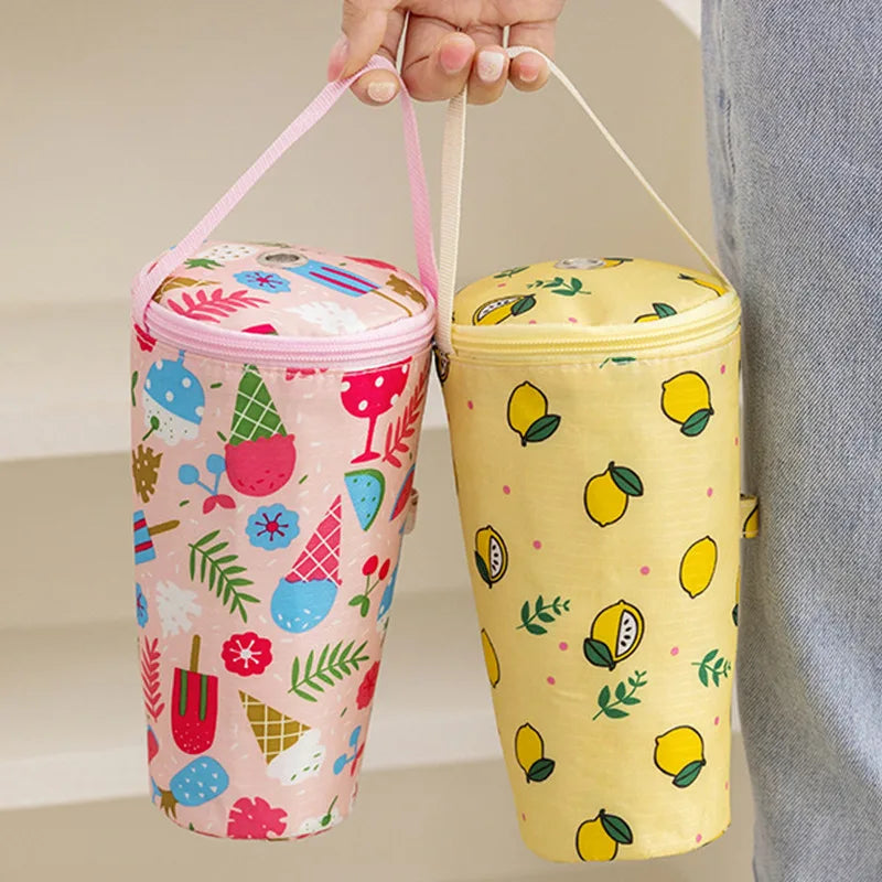 Cartoon thermal bag for baby milk bottles, waterproof, portable, featuring colorful prints in pink and yellow.