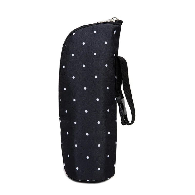 Black bag with white polka dots on a white background