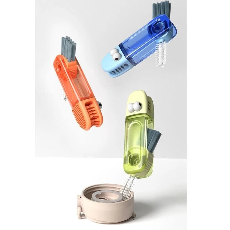 Three colorful cleaning brushes on a white background