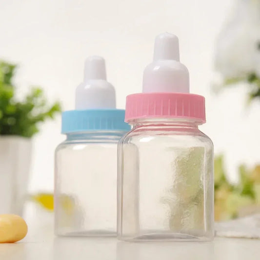 Two small glass bottles with colorful lids on a blurred background