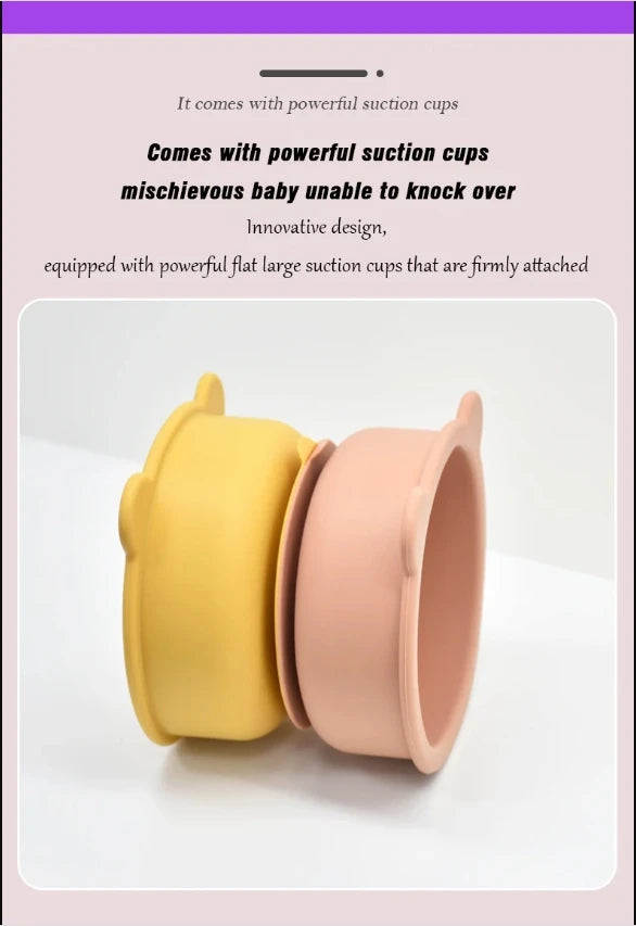 Two silicone baby cups with suction cups on a white background