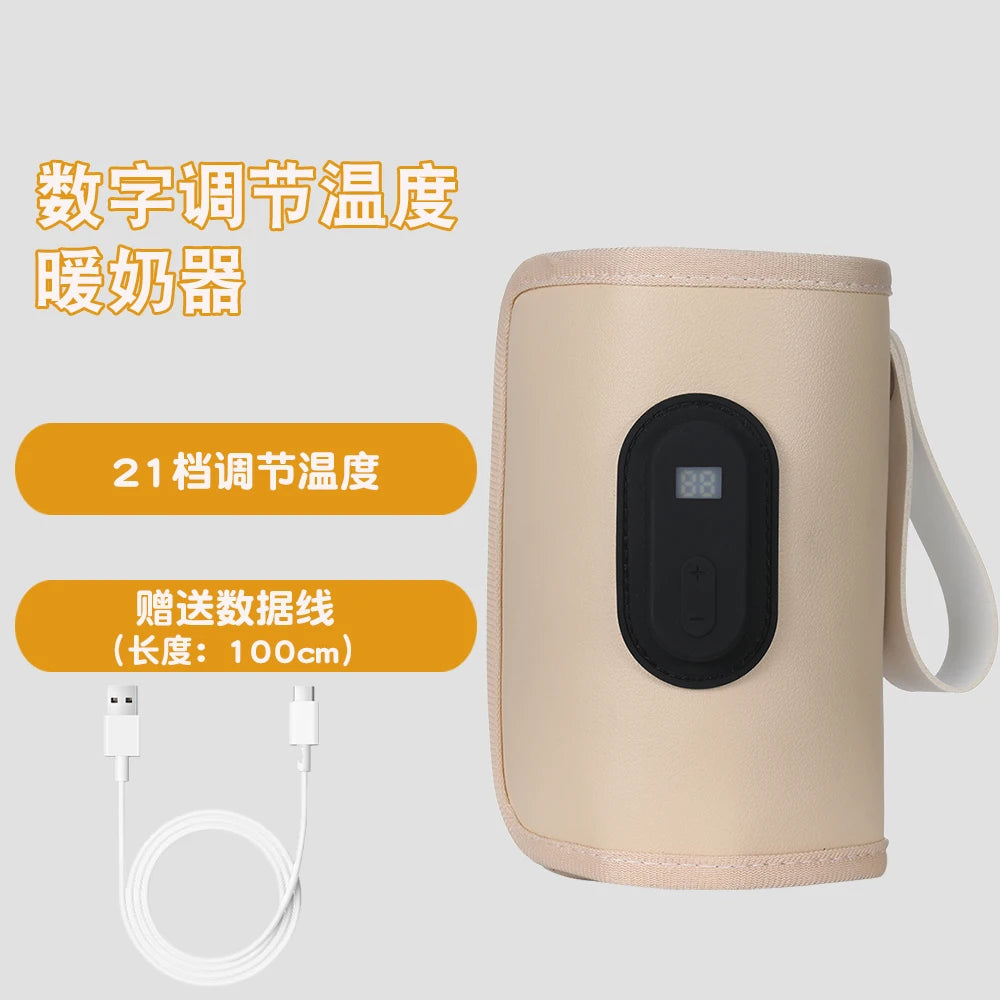 Beige electric warmer with digital display and USB cable on a white background