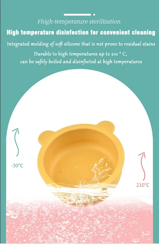 Yellow silicone bowl with text about high-temperature sterilization on a teal background