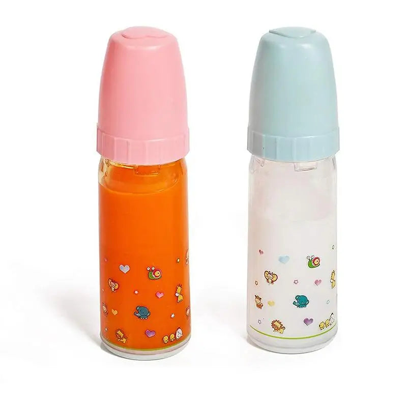 Two baby bottles with colorful caps on a white background